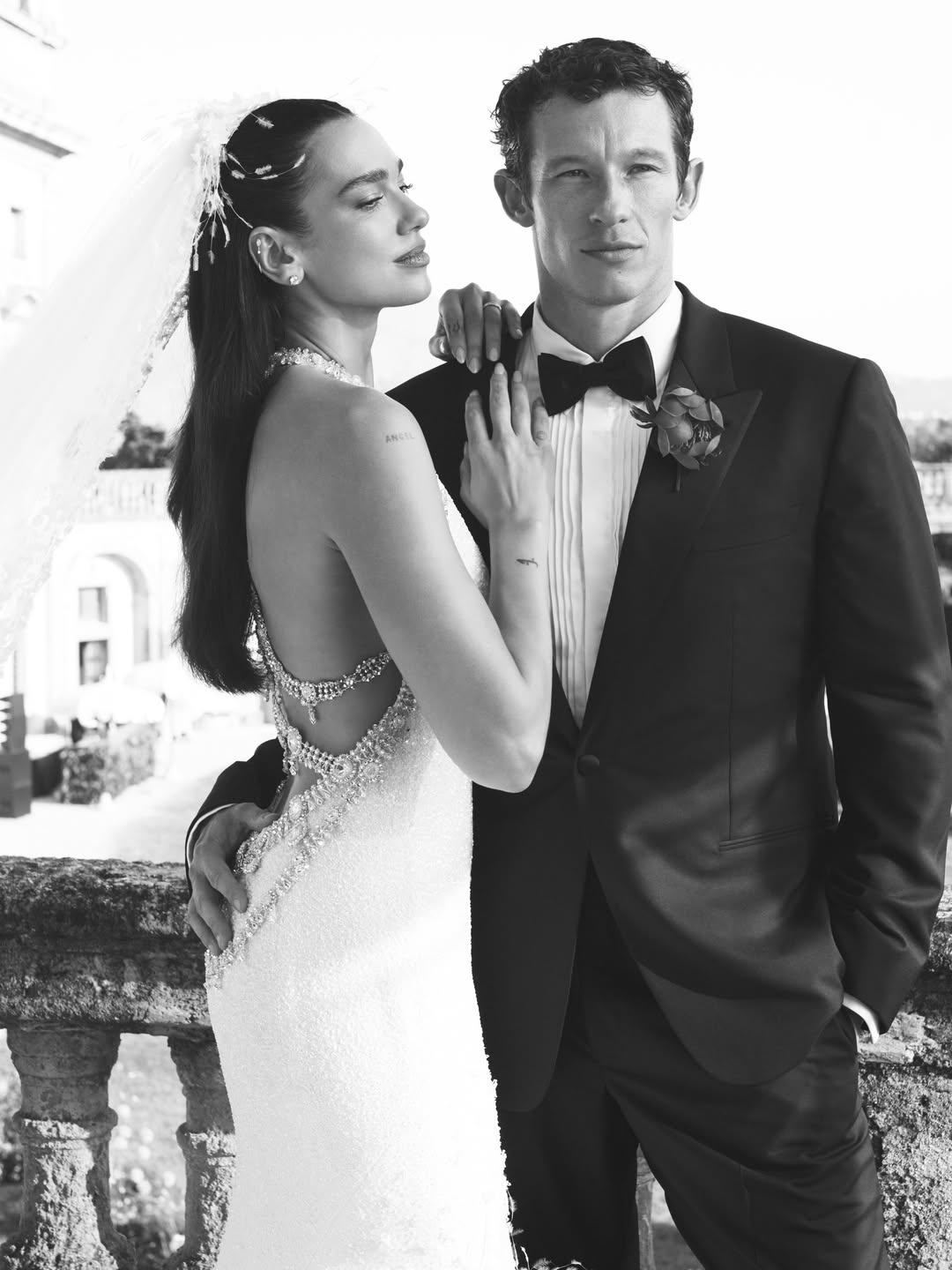Dua Lipa & Callum Turner Wear Custom Chanel & Louis Vuitton On Their Wedding Day