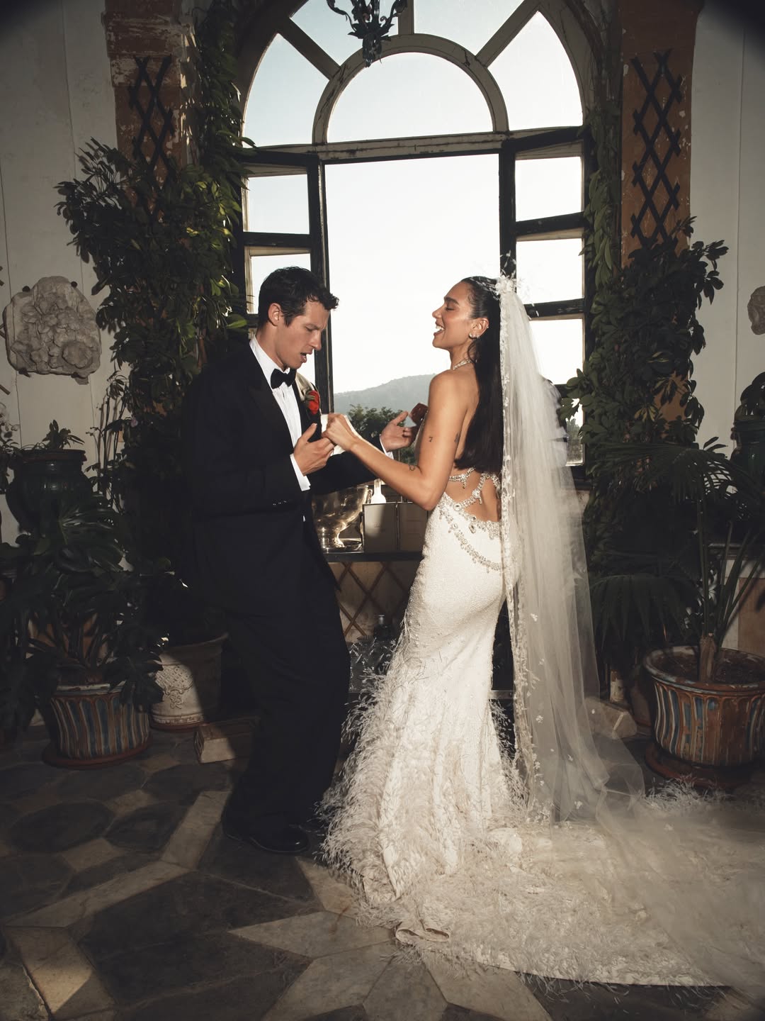 Dua Lipa & Callum Turner Wear Custom Chanel & Louis Vuitton On Their Wedding Day