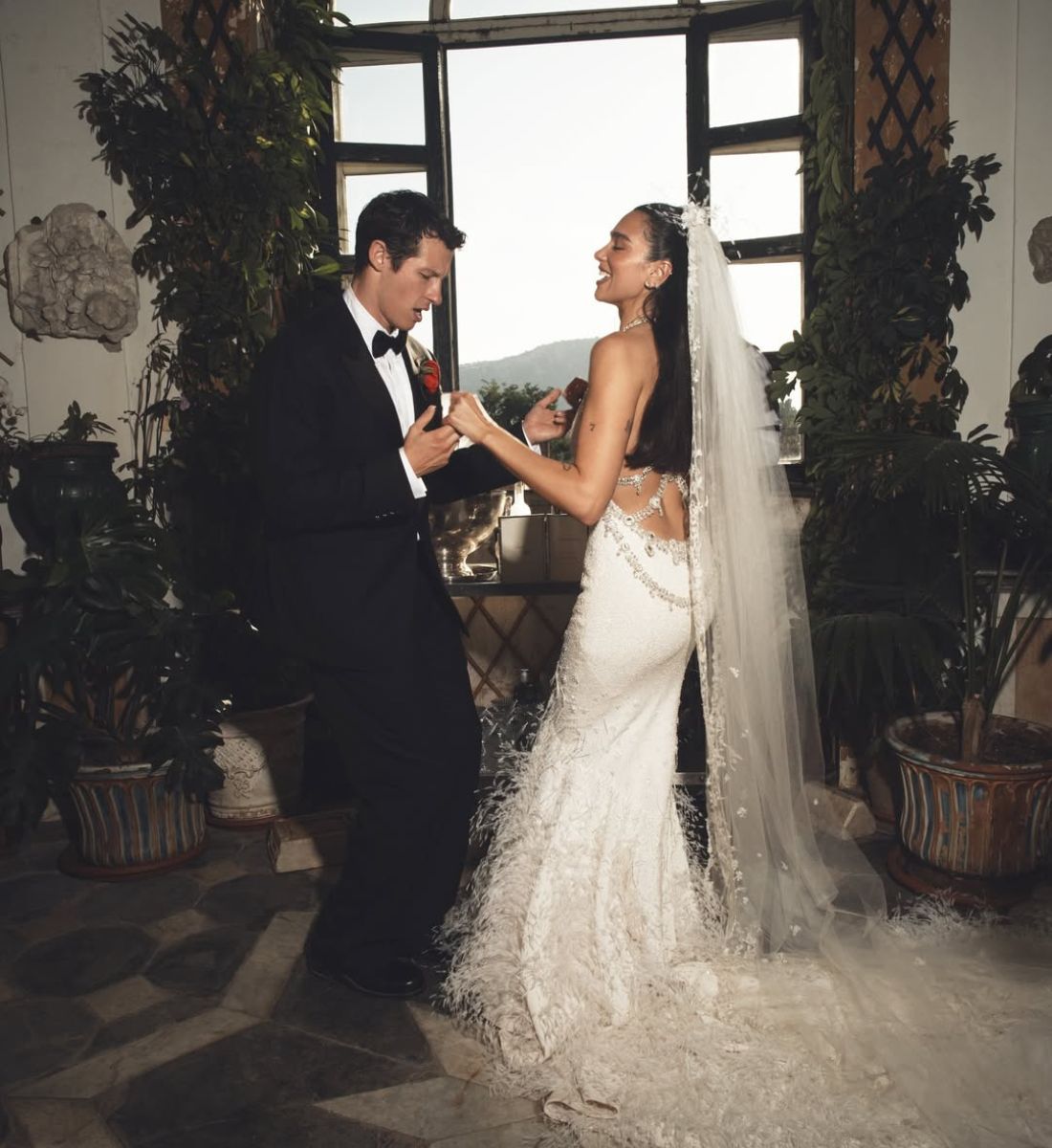 Dua Lipa & Callum Turner Wear Custom Chanel & Louis Vuitton On Their Wedding Day