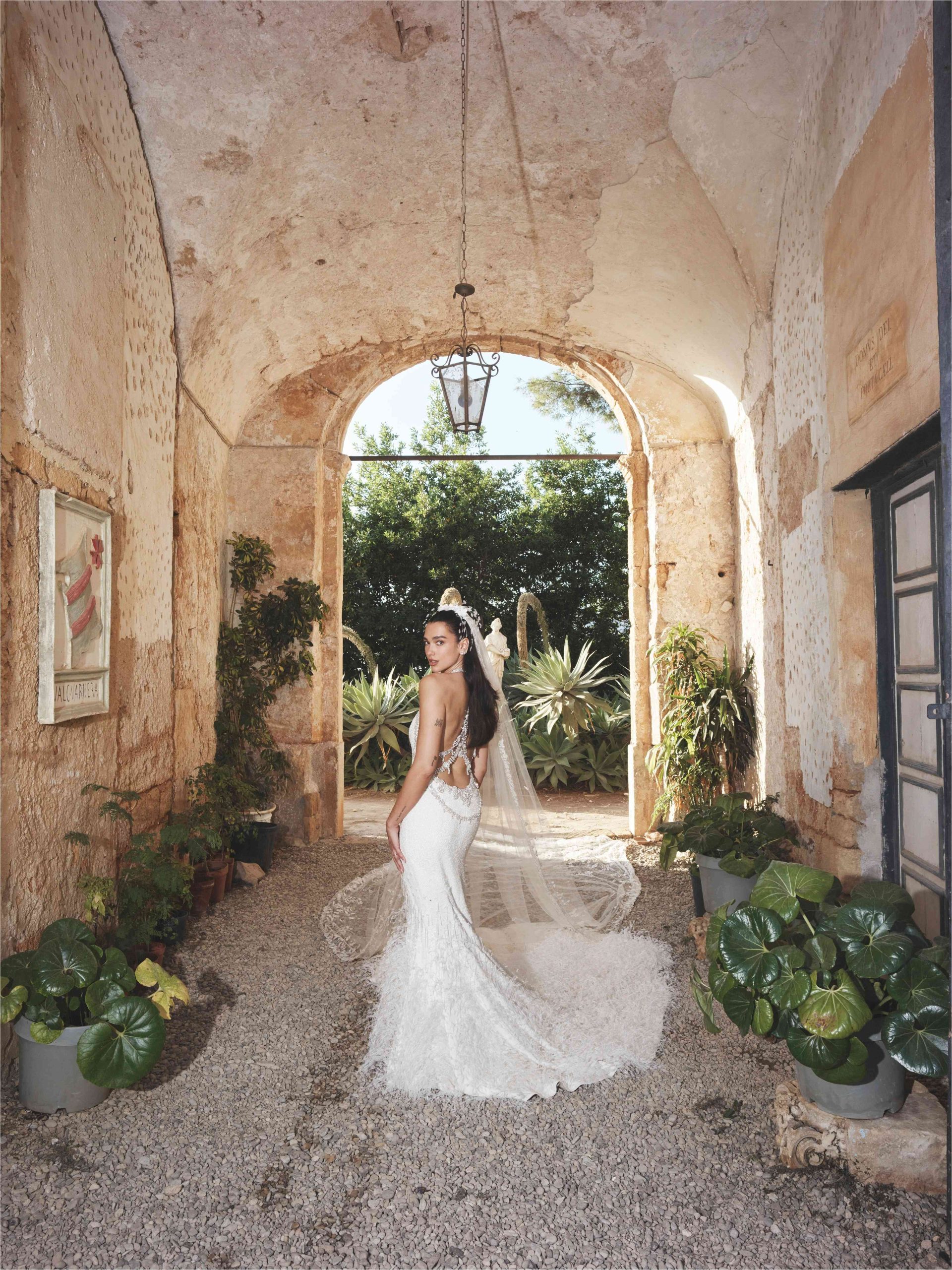 Dua Lipa & Callum Turner Wear Custom Chanel & Louis Vuitton On Their Wedding Day